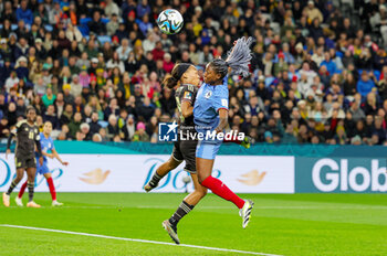 2023-07-24 - Kadidiatou Diani (11) of France heads towards goal and clashes with Tiernny Wiltshire (19) of Jamaica in the air during the 2023 FIFA Women’s World Cup, Group F football match between France and Jamaica on 23 July 2023 at Stadium Australia in Sydney, Australia - FOOTBALL - WOMEN'S WORLD CUP 2023 - FRANCE V JAMAICA - FIFA WORLD CUP - SOCCER
