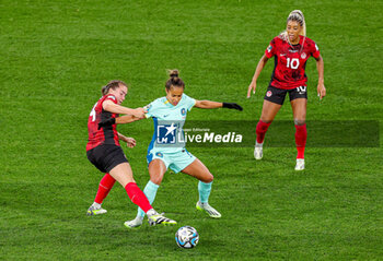 2023-08-01 - Mary Fowler (11) of Australia tussles with Vanessa Gilles (14) of Canada during the 2023 FIFA Women’s World Cup, Group B football match between Canada and Australia on 31 July 2023 at Melbourne Rectangular Stadium in Melbourne, Australia - FOOTBALL - WOMEN'S WORLD CUP 2023 - CANADA V AUSTRALIA - FIFA WORLD CUP - SOCCER
