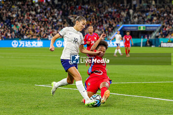 2023-08-02 - Yomira Pinzon (5) of Panama slides in and tackles Clara Mateo (12) of France during the 2023 FIFA Women’s World Cup, Group F football match between Panama and France on 2 August 2023 at Sydney Football Stadium in Sydney, Australia - FOOTBALL - WOMEN'S WORLD CUP 2023 - PANAMA V FRANCE - FIFA WORLD CUP - SOCCER