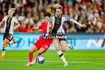 2023-08-03 - Kim Hye-ri (20) of Korea Republic tackles Jule Brand (22) of Germany during the 2023 FIFA Women’s World Cup, Group H football match between Korea Republic and Germany on 3 August 2023 at Brisbane Stadium in Brisbane, Australia - FOOTBALL - WOMEN'S WORLD CUP 2023 - KOREA REPUBLIC V GERMANY - FIFA WORLD CUP - SOCCER