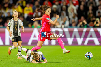 2023-08-03 - Alexandra Popp (11) of Germany and Choe Yu-ri (11) of Korea Republic during the 2023 FIFA Women’s World Cup, Group H football match between Korea Republic and Germany on 3 August 2023 at Brisbane Stadium in Brisbane, Australia - FOOTBALL - WOMEN'S WORLD CUP 2023 - KOREA REPUBLIC V GERMANY - FIFA WORLD CUP - SOCCER