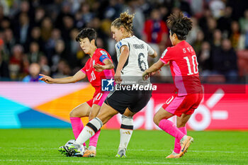 2023-08-03 - Kim Hye-ri (20) of Korea Republic and Lena Oberdorf (6) of Germany during the 2023 FIFA Women’s World Cup, Group H football match between Korea Republic and Germany on 3 August 2023 at Brisbane Stadium in Brisbane, Australia - FOOTBALL - WOMEN'S WORLD CUP 2023 - KOREA REPUBLIC V GERMANY - FIFA WORLD CUP - SOCCER