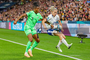 2023-08-07 - Alessia Russo (23) of England and Osinachi Ohale (3) of Nigeria during the 2023 FIFA Women’s World Cup, Round of 16 football match between England and Nigeria on 7 August 2023 at Brisbane Stadium in Brisbane, Australia - FOOTBALL - WOMEN'S WORLD CUP 2023 - ENGLAND V NIGERIA - FIFA WORLD CUP - SOCCER