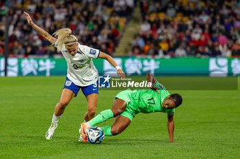 2023-08-07 - Rachel Daly (9) of England tussles with Francisca Ordega (17) of Nigeria during the 2023 FIFA Women’s World Cup, Round of 16 football match between England and Nigeria on 7 August 2023 at Brisbane Stadium in Brisbane, Australia - FOOTBALL - WOMEN'S WORLD CUP 2023 - ENGLAND V NIGERIA - FIFA WORLD CUP - SOCCER