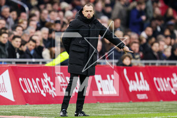 2023-02-19 - Coach John Heitinga of Ajax during the Netherlands championship Eredivisie football match between Ajax and Sparta Rotterdam on February 19, 2023 at Johan Cruijff ArenA in Amsterdam, Netherlands - FOOTBALL - NETHERLANDS CHAMP - AJAX V SPARTA ROTTERDAM - NETHERLANDS EREDIVISIE - SOCCER