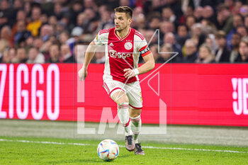 2023-04-16 - Dusan Tadic of Ajax during the Netherlands championship Eredivisie football match between Ajax and FC Emmen on April 16, 2023 at Johan Cruijff ArenA in Amsterdam, Netherlands - FOOTBALL - NETHERLANDS CHAMP - AJAX V EMMEN - NETHERLANDS EREDIVISIE - SOCCER