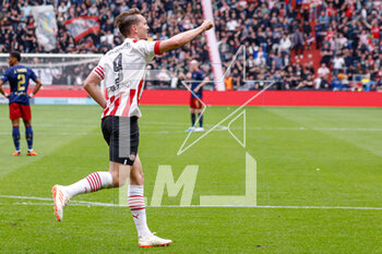 2023-04-23 - Luuk de Jong of PSV celebrates after scoring his teams first goal during the Netherlands championship Eredivisie football match between PSV and Ajax on April 23, 2023 at Philips Stadion in Eindhoven, Netherlands - FOOTBALL - NETHERLANDS CHAMP - PSV V AJAX - NETHERLANDS EREDIVISIE - SOCCER