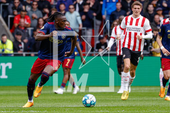 2023-04-23 - Calvin Bassey of Ajax during the Netherlands championship Eredivisie football match between PSV and Ajax on April 23, 2023 at Philips Stadion in Eindhoven, Netherlands - FOOTBALL - NETHERLANDS CHAMP - PSV V AJAX - NETHERLANDS EREDIVISIE - SOCCER