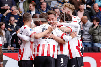 2023-04-23 - Luuk de Jong of PSV celebrates with teammates after scoring his teams first goal during the Netherlands championship Eredivisie football match between PSV and Ajax on April 23, 2023 at Philips Stadion in Eindhoven, Netherlands - FOOTBALL - NETHERLANDS CHAMP - PSV V AJAX - NETHERLANDS EREDIVISIE - SOCCER