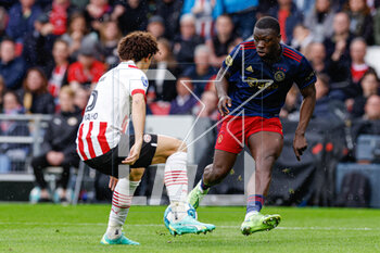 2023-04-23 - Andre Ramalho of PSV, Brian Brobbey of Ajax during the Netherlands championship Eredivisie football match between PSV and Ajax on April 23, 2023 at Philips Stadion in Eindhoven, Netherlands - FOOTBALL - NETHERLANDS CHAMP - PSV V AJAX - NETHERLANDS EREDIVISIE - SOCCER