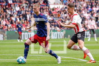 2023-04-23 - Kenneth Taylor of Ajax, Joey Veerman of PSV during the Netherlands championship Eredivisie football match between PSV and Ajax on April 23, 2023 at Philips Stadion in Eindhoven, Netherlands - FOOTBALL - NETHERLANDS CHAMP - PSV V AJAX - NETHERLANDS EREDIVISIE - SOCCER