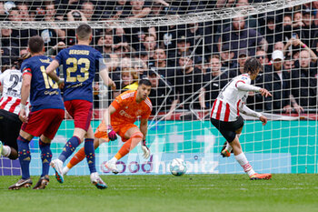 2023-04-23 - Xavi Simons of PSV scoring a goal from penalty point, goalkeeper Geronimo Rulli of Ajax during the Netherlands championship Eredivisie football match between PSV and Ajax on April 23, 2023 at Philips Stadion in Eindhoven, Netherlands - FOOTBALL - NETHERLANDS CHAMP - PSV V AJAX - NETHERLANDS EREDIVISIE - SOCCER