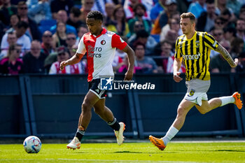 2023-05-28 - Quinten Timber of Feyenoord is challenged by Kacper Kozlowski of Vitesse during the Netherlands championship Eredivisie football match between Feyenoord and Vitesse on May 28, 2023 at Stadion Feijenoord in Rotterdam, Netherlands - FOOTBALL - NETHERLANDS CHAMP - FEYENOORD V VITESSE - NETHERLANDS EREDIVISIE - SOCCER