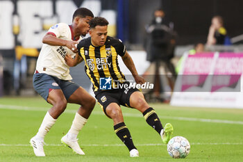 2023-08-19 - Million Manhoef of Vitesse battles for the ball with Shurandy Sambo of PSV during the Netherlands championship Eredivisie football match between Vitesse and PSV on August 19, 2023 at GelreDome in Arnhem, Netherlands - FOOTBALL - NETHERLANDS CHAMP - VITESSE V PSV - NETHERLANDS EREDIVISIE - SOCCER