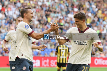 2023-08-19 - Luuk de Jong of PSV celebrates his goal with Guus Til during the Netherlands championship Eredivisie football match between Vitesse and PSV on August 19, 2023 at GelreDome in Arnhem, Netherlands - FOOTBALL - NETHERLANDS CHAMP - VITESSE V PSV - NETHERLANDS EREDIVISIE - SOCCER