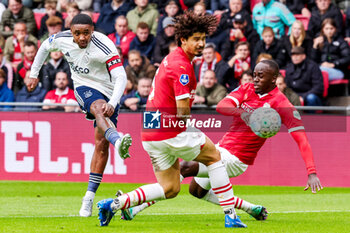2023-10-29 - Steven Bergwijn of AFC Ajax and André Ramalho, Jordan Teze of PSV during the Netherlands championship Eredivisie football match between PSV and AFC Ajax on October 29, 2023 at Philips Stadion in Eindhoven, Netherlands - FOOTBALL - NETHERLANDS CHAMP - PSV V AJAX - NETHERLANDS EREDIVISIE - SOCCER