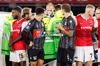 2023-10-29 - Bas Dost of NEC standing up and is awake after crashing down on the field during the Netherlands championship Eredivisie football match between AZ and NEC on October 29, 2023 at AFAS Stadion in Alkmaar, Netherlands - FOOTBALL - NETHERLANDS CHAMP - AZ V NEC - NETHERLANDS EREDIVISIE - SOCCER
