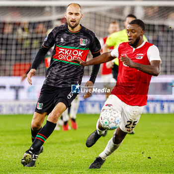 2023-10-29 - Bas Dost of NEC, Richedly Bazoer of AZ during the Netherlands championship Eredivisie football match between AZ and NEC on October 29, 2023 at AFAS Stadion in Alkmaar, Netherlands - FOOTBALL - NETHERLANDS CHAMP - AZ V NEC - NETHERLANDS EREDIVISIE - SOCCER