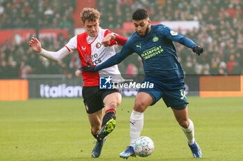 2023-12-03 - Ismael Saibari of PSV battles for the ball with Mats Wieffer of Feyenoord during the Netherlands championship Eredivisie football match between Feyenoord and PSV on December 3, 2023 at Stadion Feijenoord in Rotterdam, Netherlands - FOOTBALL - NETHERLANDS CHAMP - FEYENOORD V PSV - NETHERLANDS EREDIVISIE - SOCCER