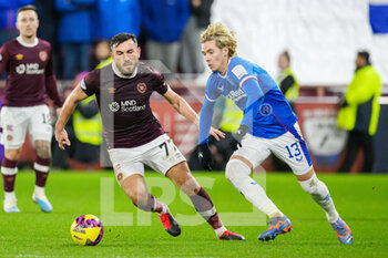 2023-02-01 - Todd Cantwell of Rangers and Robert Snodgrass of Hearts during the Scottish championship, Cinch SPFL Premiership football match between Heart of Midlothian and Rangers on February 1, 2023 at Tynecastle Park in Edinburgh, Scotland - FOOTBALL - SCOTTISH CHAMP - HEART OF MIDLOTHIAN V RANGERS - SCOTTISH PREMIERSHIP - SOCCER