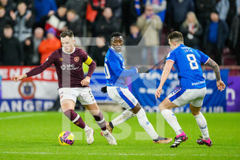 2023-02-01 - Lawrence Shankland of Hearts and Fashion Sakala, Ryan Jack of Rangers during the Scottish championship, Cinch SPFL Premiership football match between Heart of Midlothian and Rangers on February 1, 2023 at Tynecastle Park in Edinburgh, Scotland - FOOTBALL - SCOTTISH CHAMP - HEART OF MIDLOTHIAN V RANGERS - SCOTTISH PREMIERSHIP - SOCCER