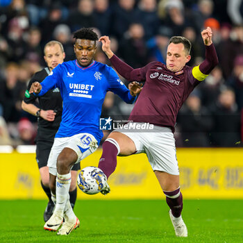 2023-12-06 - Jose Cifuentes of Rangers and Lawrence Shankland of Hearts during the Scottish championship Premiership football match between Heart of Midlothian and Rangers on 6 December 2023 at Tynecastle Park in Edinburgh, Scotland - FOOTBALL - SCOTTISH CHAMP - HEART OF MIDLOTHIAN V RANGERS - SCOTTISH PREMIERSHIP - SOCCER