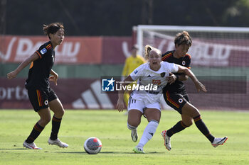 2023-09-30 - Oona Sevenius of Como Women and Moeka Minami of A.S. Roma Women during the 2nd day of the Serie A Championship between A.S. Roma Women - Como Women on September 30, 2023 at the Tre Fontane Stadium in Rome, Italy. - AS ROMA VS FC COMO WOMEN - ITALIAN SERIE A WOMEN - SOCCER