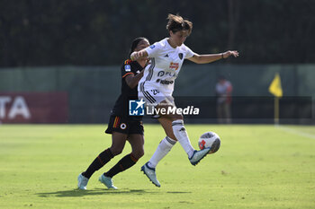 2023-09-30 - Sara Baldi of Como Women and Eseosa Aigbougun of A.S. Roma Women during the 2nd day of the Serie A Championship between A.S. Roma Women - Como Women on September 30, 2023 at the Tre Fontane Stadium in Rome, Italy. - AS ROMA VS FC COMO WOMEN - ITALIAN SERIE A WOMEN - SOCCER