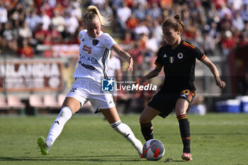 2023-09-30 - Matilde Lundorf of Como Women and Manuela Giugliano of A.S. Roma Women during the 2nd day of the Serie A Championship between A.S. Roma Women - Como Women on September 30, 2023 at the Tre Fontane Stadium in Rome, Italy. - AS ROMA VS FC COMO WOMEN - ITALIAN SERIE A WOMEN - SOCCER