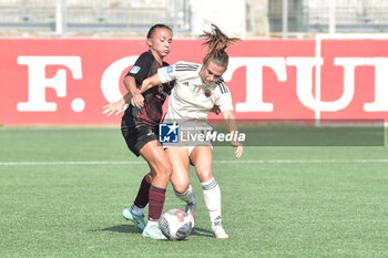 2023-10-07 - Emilie Bosshard Haavi of AS Roma competes for the ball with Iris Madeleine Rabot of Pomigliano Calcio during Serie A Women between Pomigliano CF vs AS Roma at Amerigo Liguori Stadium - POMIGLIANO WOMEN VS AS ROMA - ITALIAN SERIE A WOMEN - SOCCER