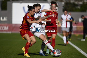 2023-12-10 - Lucia Di Guglielmo of A.S. Roma Women and Julie Piga of A.C. Milan Femminile during the 10th day of the Serie A Championship between A.S. Roma Women vs A.C. MIlan on 10 December 2023 at the Tre Fontane Stadium in Rome, Italy. - AS ROMA VS AC MILAN - ITALIAN SERIE A WOMEN - SOCCER