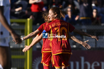 2023-12-10 - Manuela Giugliano of A.S. Roma Women celebrates Lucia Di Guglielmo of A.S. Roma Women after scoring 2-1 during the 10th day of the Serie A Championship between A.S. Roma Women vs A.C. MIlan on 10 December 2023 at the Tre Fontane Stadium in Rome, Italy. - AS ROMA VS AC MILAN - ITALIAN SERIE A WOMEN - SOCCER