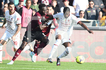 2023-01-04 - Ismael Bennacer of AC Milan and Junior Sambia of US Salernitana  competes for the ball withduring the friendly football match US Salernitana 1919 v AC Milan   at Arechi stadium  - US SALERNITANA VS AC MILAN - ITALIAN SERIE A - SOCCER