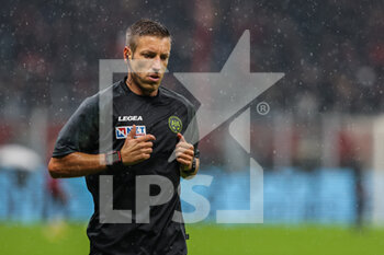 2023-01-08 - Referee Davide Massa warms up during Serie A 2022/23 football match between AC Milan and AS Roma at San Siro Stadium, Milan, Italy on January 08, 2023 - AC MILAN VS AS ROMA - ITALIAN SERIE A - SOCCER