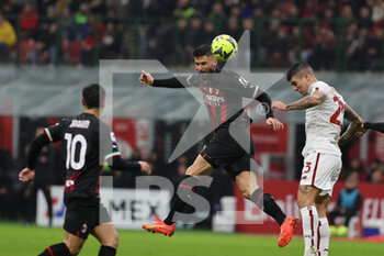 2023-01-08 - Olivier Giroud of AC Milan in action during Serie A 2022/23 football match between AC Milan and AS Roma at San Siro Stadium, Milan, Italy on January 08, 2023 - AC MILAN VS AS ROMA - ITALIAN SERIE A - SOCCER
