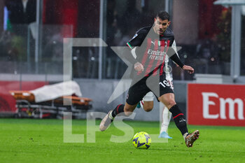 2023-01-08 - Theo Hernandez of AC Milan in action during Serie A 2022/23 football match between AC Milan and AS Roma at San Siro Stadium, Milan, Italy on January 08, 2023 - AC MILAN VS AS ROMA - ITALIAN SERIE A - SOCCER