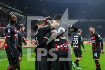2023-01-08 - Pierre Kalulu of AC Milan celebrates with his teammates after scoring a goal during Serie A 2022/23 football match between AC Milan and AS Roma at San Siro Stadium, Milan, Italy on January 08, 2023 - AC MILAN VS AS ROMA - ITALIAN SERIE A - SOCCER