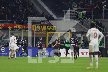 2023-01-08 - Tommaso Pobega of AC Milan celebrates with his teammates after scoring a goal during Serie A 2022/23 football match between AC Milan and AS Roma at San Siro Stadium, Milan, Italy on January 08, 2023 - AC MILAN VS AS ROMA - ITALIAN SERIE A - SOCCER