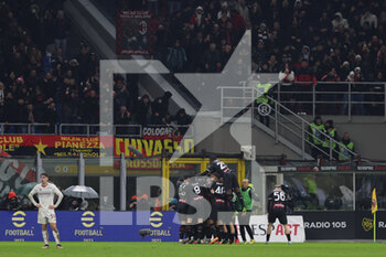 2023-01-08 - Tommaso Pobega of AC Milan celebrates with his teammates after scoring a goal during Serie A 2022/23 football match between AC Milan and AS Roma at San Siro Stadium, Milan, Italy on January 08, 2023 - AC MILAN VS AS ROMA - ITALIAN SERIE A - SOCCER