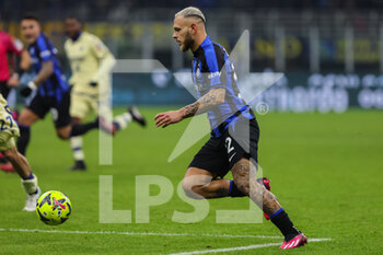 2023-01-14 - Federico Dimarco of FC Internazionale in action during Serie A 2022/23 football match between FC Internazionale and Hellas Verona FC at Giuseppe Meazza Stadium, Milan, Italy on January 14, 2023 - INTER - FC INTERNAZIONALE VS HELLAS VERONA - ITALIAN SERIE A - SOCCER