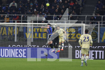 2023-01-14 - Andre Onana of FC Internazionale competes for the ball with Kevin Lasagna of Hellas Verona FC and Alessandro Bastoni of FC Internazionale during Serie A 2022/23 football match between FC Internazionale and Hellas Verona FC at Giuseppe Meazza Stadium, Milan, Italy on January 14, 2023 - INTER - FC INTERNAZIONALE VS HELLAS VERONA - ITALIAN SERIE A - SOCCER