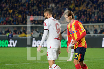 2023-01-14 - Olivier Giroud (AC Milan) and Antonino Gallo (US Lecce) - US LECCE VS AC MILAN - ITALIAN SERIE A - SOCCER