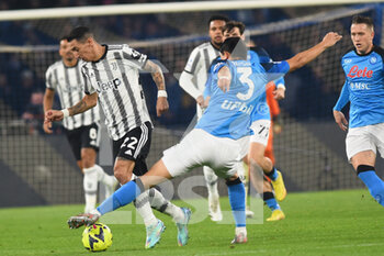 2023-01-13 - Min-Jae Kim of SSC Napoli  competes for the ball with Angel Di Maria of Juventus FC  during the Serie A match between SSC Napoli v Juventus FC  at  Stadio Diego Armando Maradona  - SSC NAPOLI VS JUVENTUS FC - ITALIAN SERIE A - SOCCER