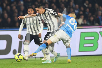 2023-01-13 - Stanislav Lobotka of SSC Napoli  competes for the ball with Angel Di Maria of Juventus FC during the Serie A match between SSC Napoli v Juventus FC  at  Stadio Diego Armando Maradona  - SSC NAPOLI VS JUVENTUS FC - ITALIAN SERIE A - SOCCER