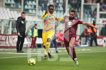 2023-01-15 - Emmanuel Gyasi (Spezia Calcio) in action against Koffi Djidji (Torino FC) - TORINO FC VS SPEZIA CALCIO - ITALIAN SERIE A - SOCCER