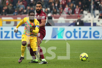 2023-01-15 - Koffi Djidji (Torino FC) in action against Emmanuel Gyasi (Spezia Calcio) - TORINO FC VS SPEZIA CALCIO - ITALIAN SERIE A - SOCCER