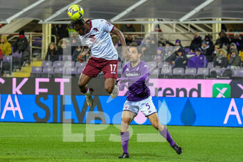 2023-01-21 - header of Torino's Singo Wilfried against Fiorentina's Giacomo Bonaventura - ACF FIORENTINA VS TORINO FC - ITALIAN SERIE A - SOCCER