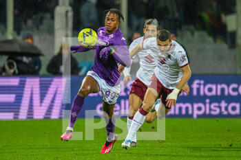 2023-01-21 - Fiorentina's Christian Kouame hampered by Torino's Alessandro Buongiorno - ACF FIORENTINA VS TORINO FC - ITALIAN SERIE A - SOCCER