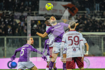2023-01-21 - header of Fiorentina's Sofyan Amrabat against Torino's Michel Adopo - ACF FIORENTINA VS TORINO FC - ITALIAN SERIE A - SOCCER