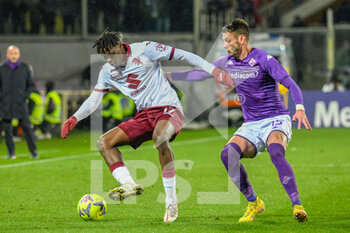 2023-01-21 - Torino's Singo Wilfried hampered by Fiorentina's Aleksa Terzić - ACF FIORENTINA VS TORINO FC - ITALIAN SERIE A - SOCCER
